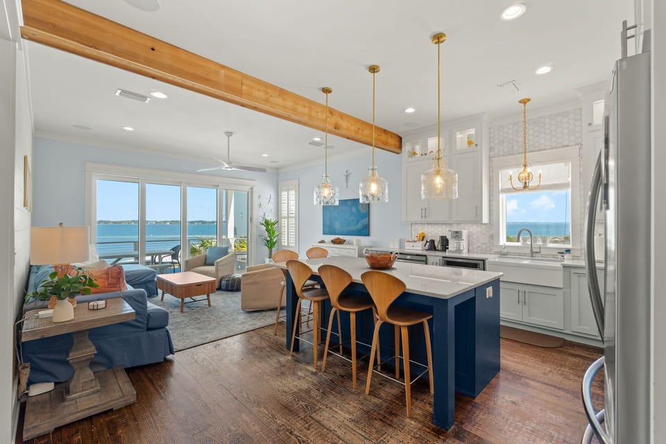 Gather where the cooking, the laughing, and the Sound view all happen at once