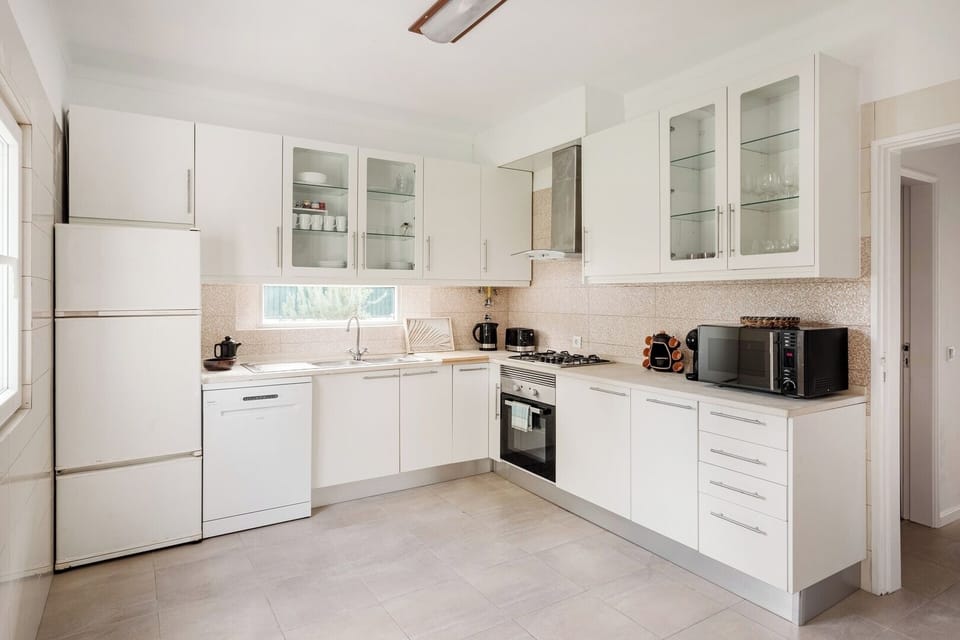 Functional and fully equipped kitchen for family use.