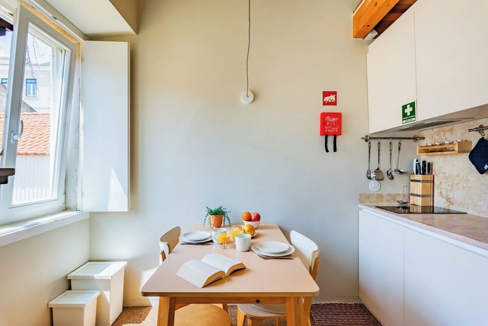 Equipped Kitchen with dining table.