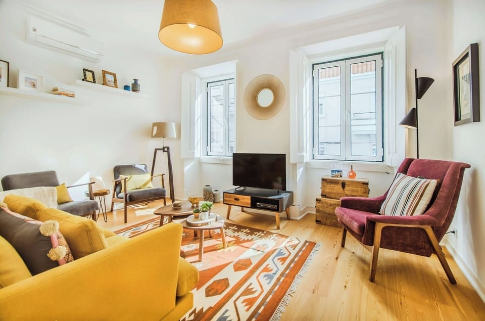 Living Room with Smart TV and Air Conditioning