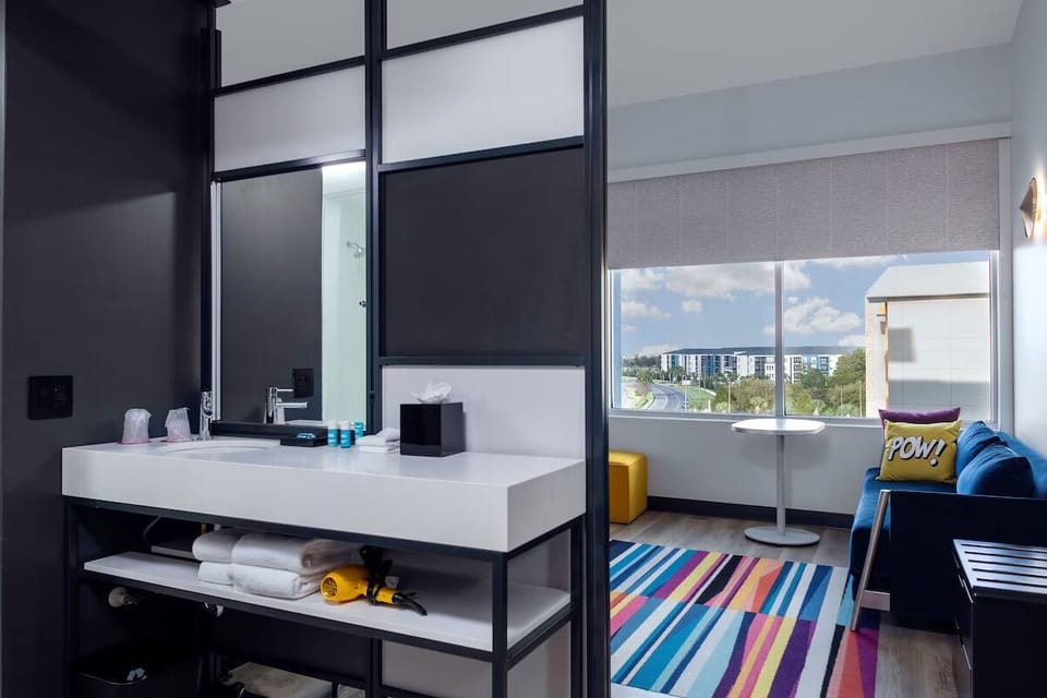 Refresh at the sleek vanity with bright, easy morning light.
