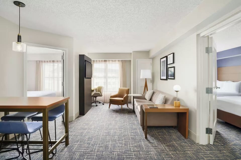 Stretch out in a roomy suite with cozy lounge seating.