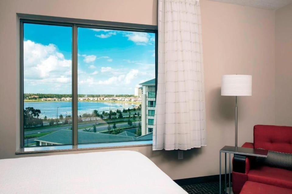 Soak up lake views from bed and cozy chair.