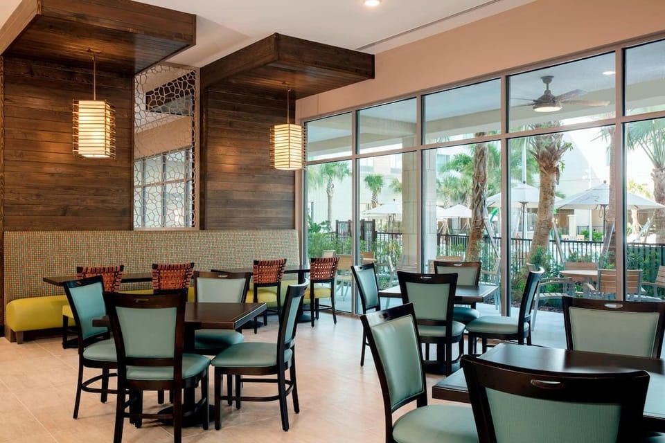 Gather for easy meals in the warm, inviting dining area.