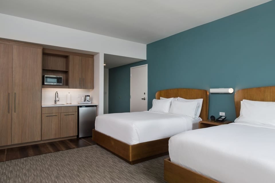 Enjoy extra space with two queen beds and a kitchenette.
