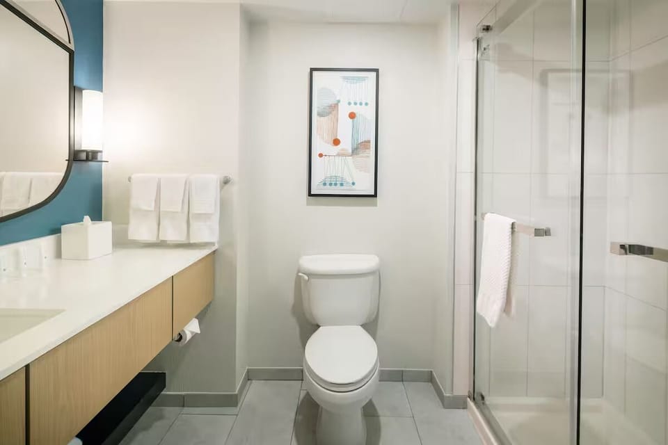 Step into a bright bathroom designed for easy mornings.