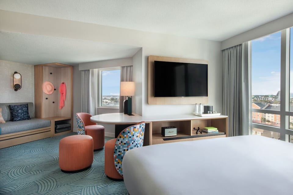 Unwind in a spacious suite with lounge seating and views.