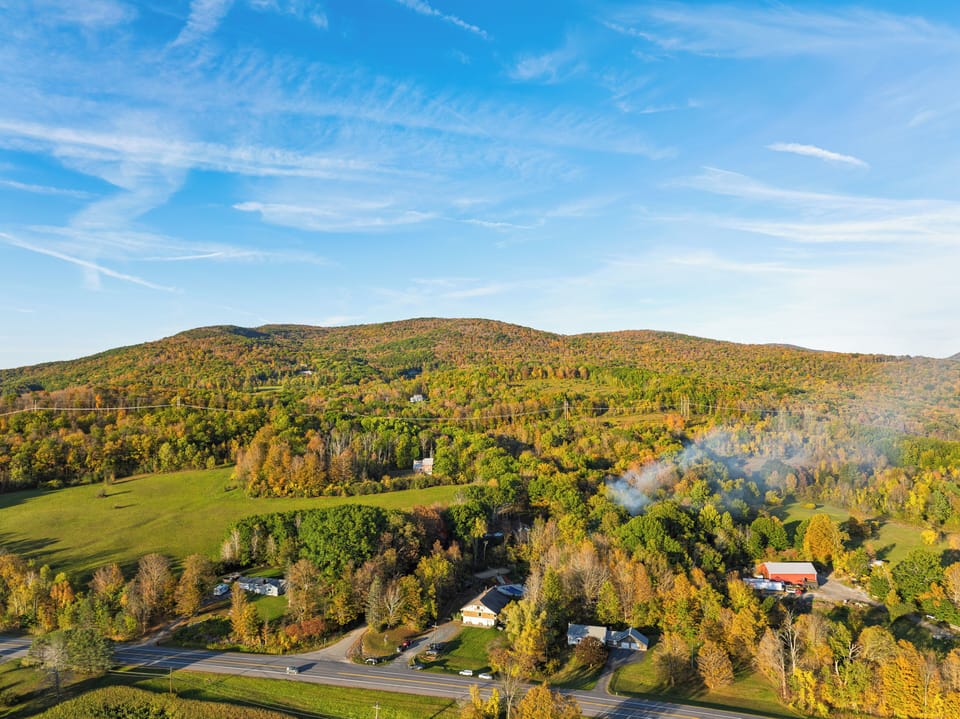 Rolling Berkshires landscape stretching beyond the property.