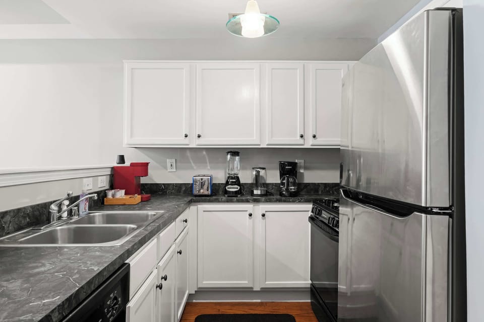 Kitchen: A bright, modern kitchen designed for effortless cooking and easy mornings.