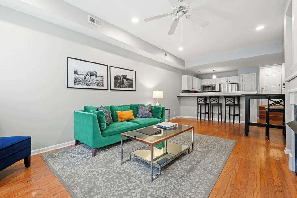 Living Room: Light-filled and stylish, this living room is made for relaxing in effortless comfort