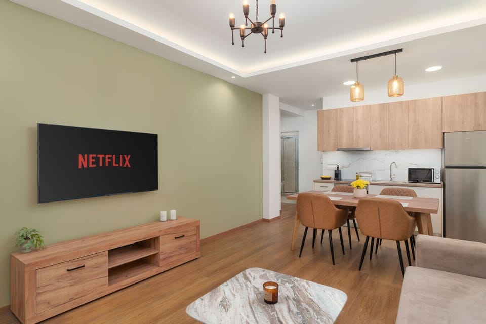 Open-plan living & dining space with Smart TV