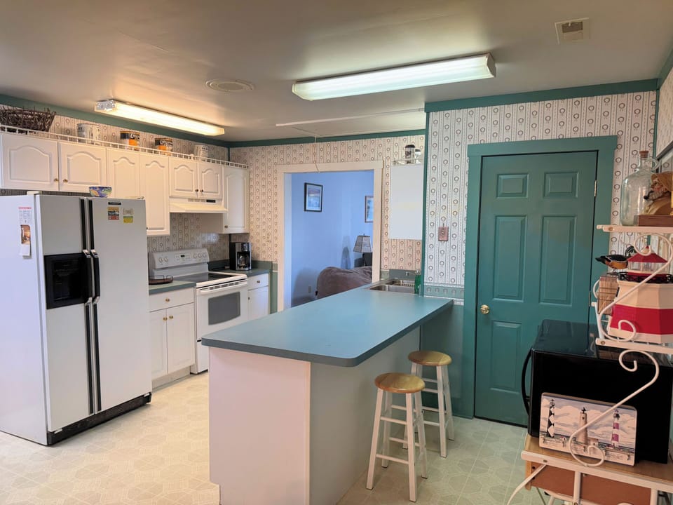 Well equipped kitchen with large dining area.