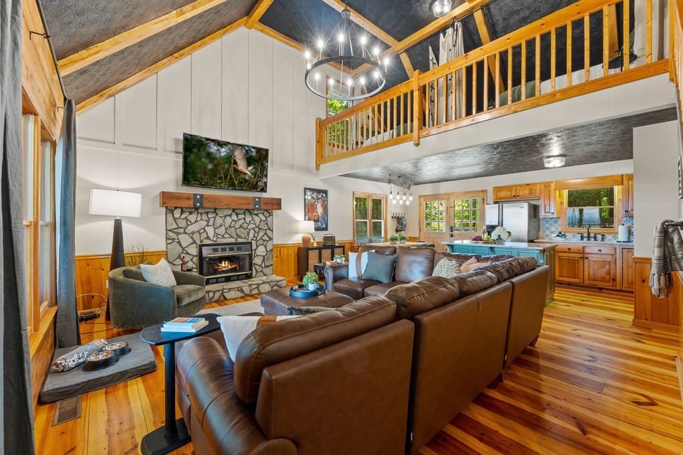 The main living area offers plenty of seating, smart TV and electric fireplace for those wonderful family evenings.