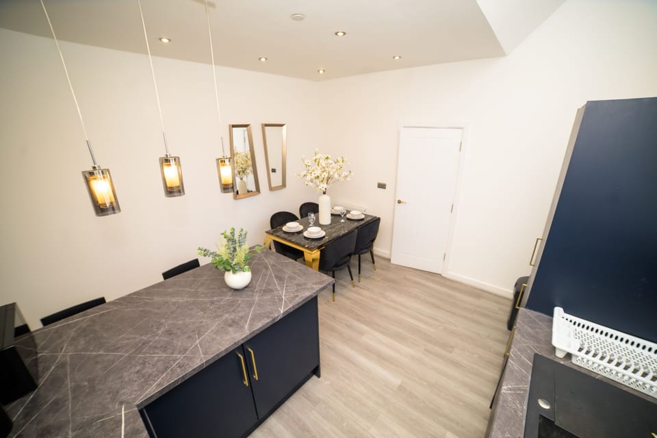 Enjoy meals together in this charming and well-set dining area.