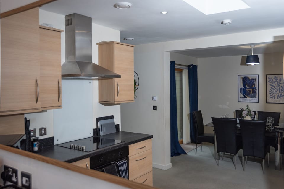 Modern open-plan kitchen and dining space designed for comfort