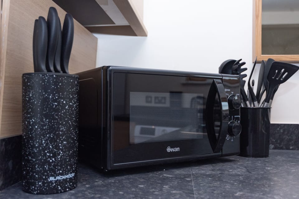 Microwave and a full range of cooking utensils provided for easy, convenient self-catering