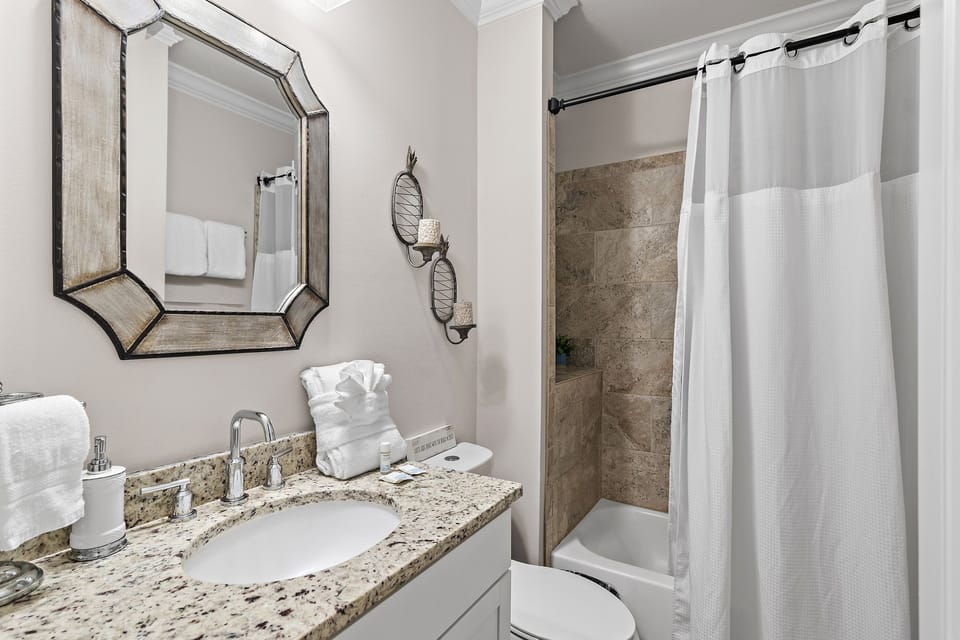 Second floor guest bathroom with shower/tub combo