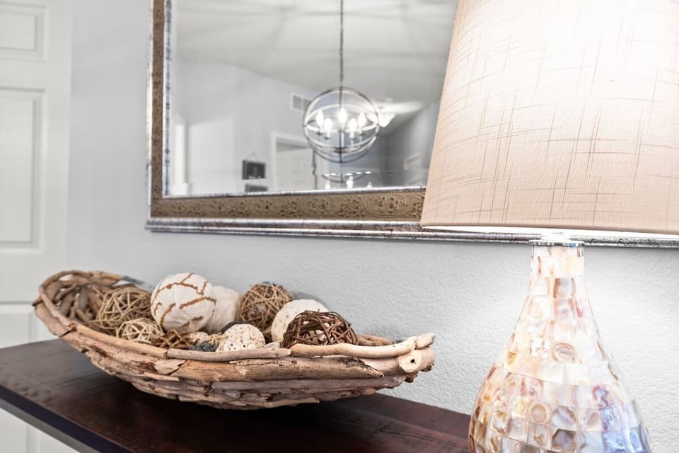 Thoughtful touches make your stay special - handcrafted decorative bowls and elegant lighting create a warm, welcoming atmosphere.