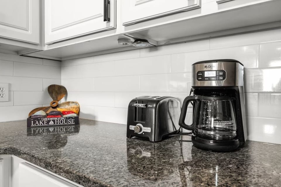Start your mornings right with freshly brewed coffee from your own kitchen setup, complete with toaster for quick breakfasts.