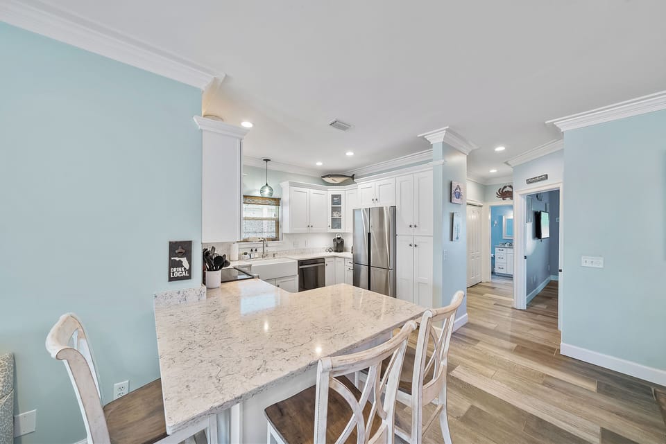 Kitchen island with bar stools