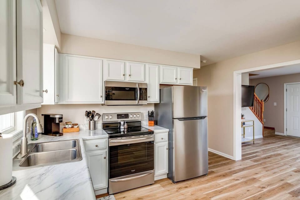 Spacious kitchen w/ stainless appliances & generous prep space