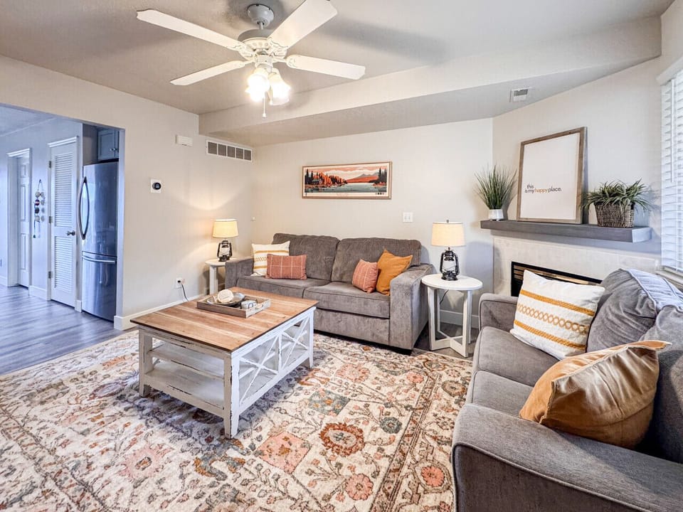 Cozy, welcoming living room with warm décor—perfect for relaxing after a day at the lake.
