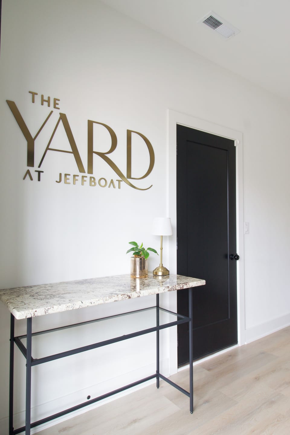 Entryway with custom signage and welcoming arrival space