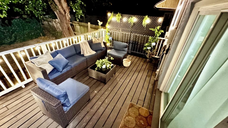 Enjoy a cozy deck right off the kitchen through the sliding door.