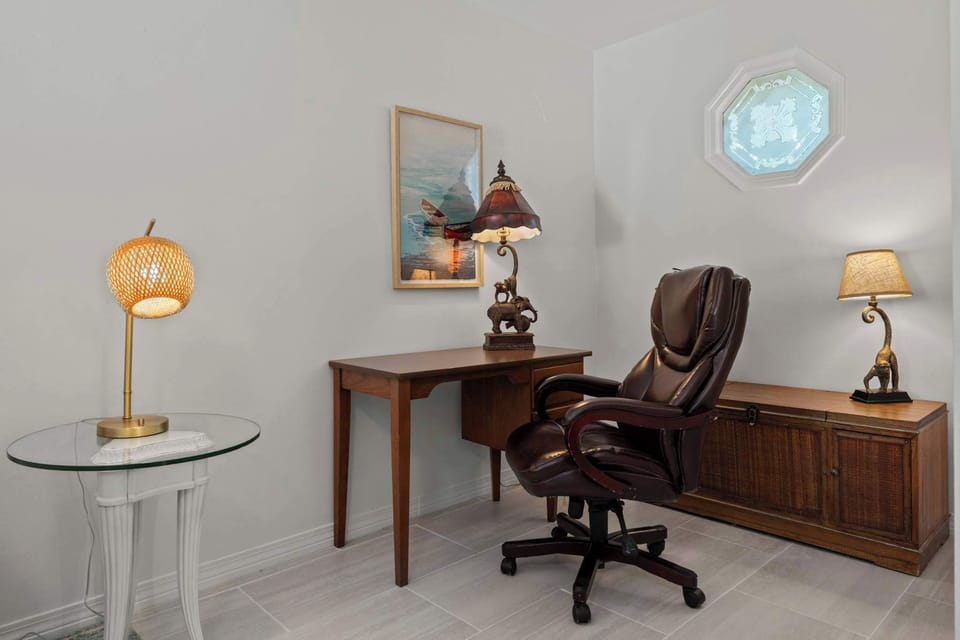 Bedroom 3 offers a desk space ideal for remote stays.