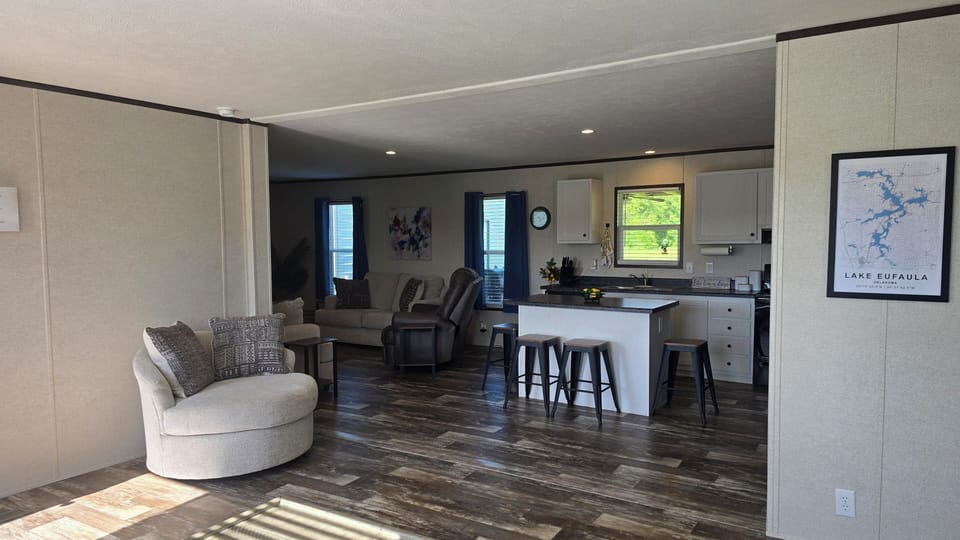 Sitting area with view of kitchen and living room