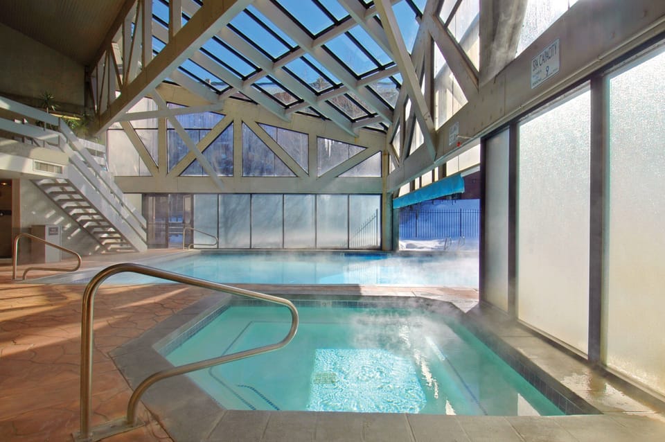 Indoor/outdoor pool with hot tub