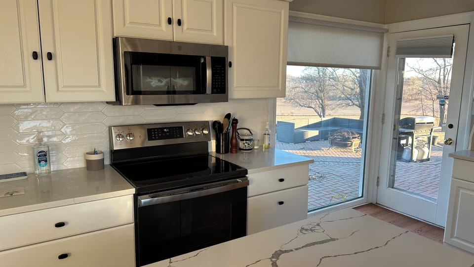 Kitchen - electric stove, oven, and microwave