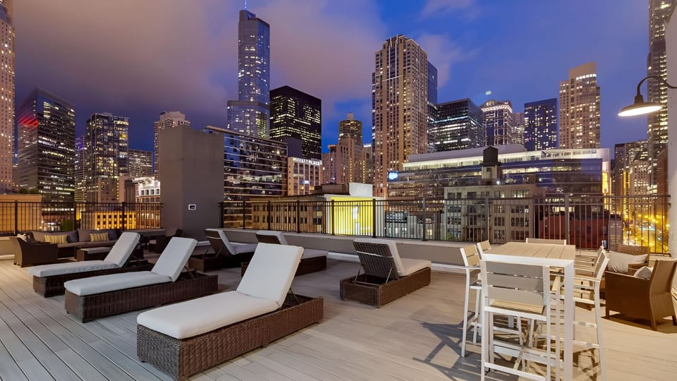 Breathe in sweeping skyline views from the expansive rooftop deck.
