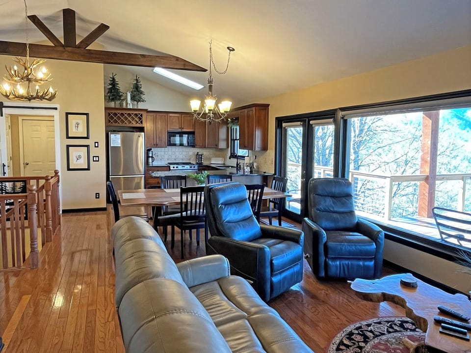 Family Room looking toward the Dining and Kitchen areas.  Laundry Room and Powder Room are to the left.