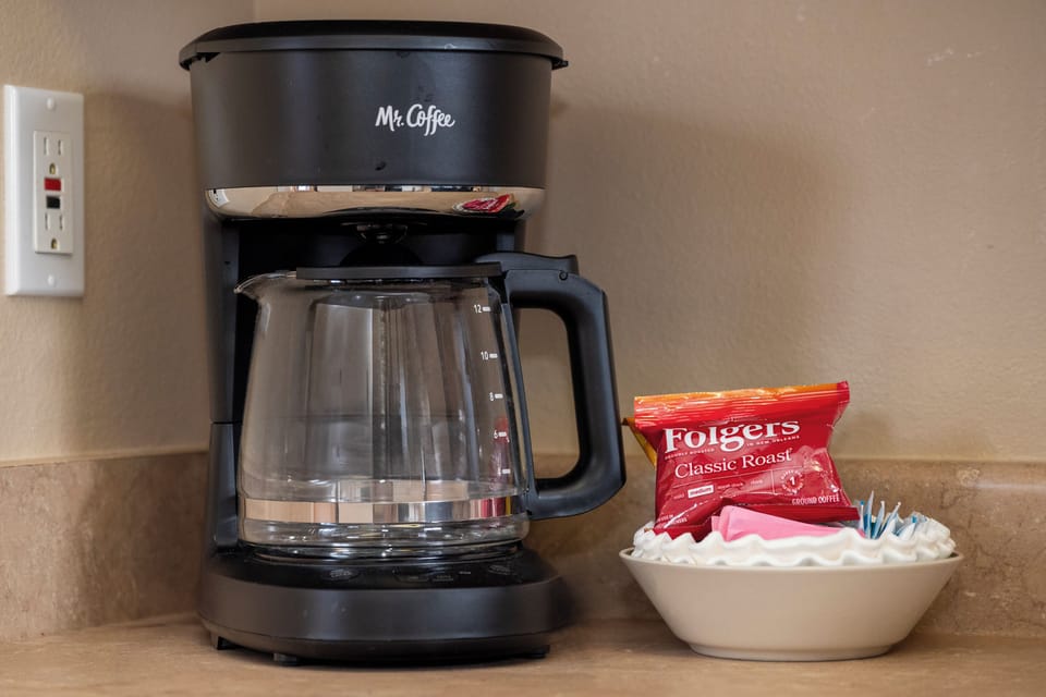 Start your mornings right with a coffee maker, premium Folgers coffee, and all the essentials for your perfect cup.