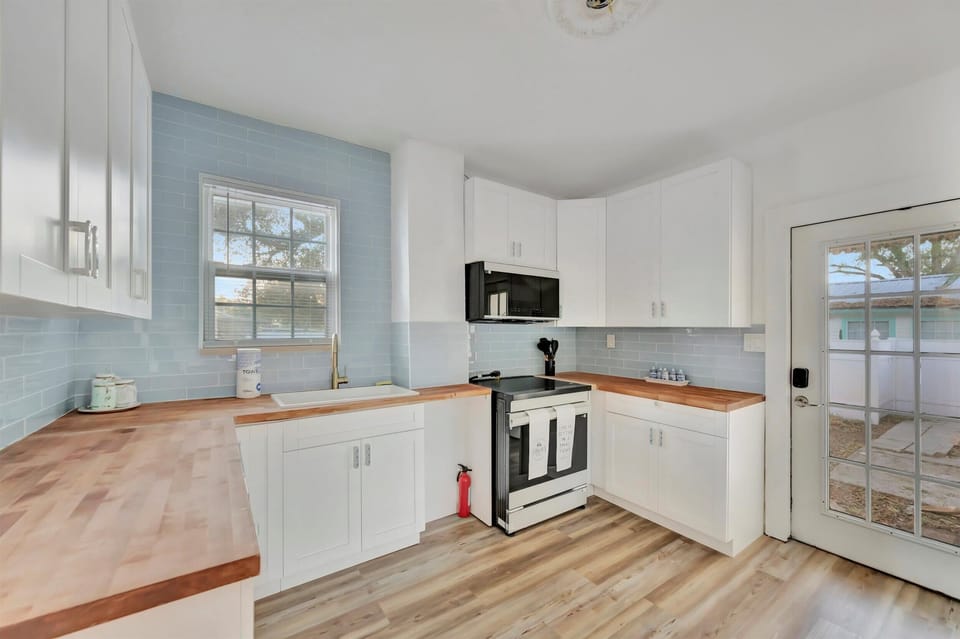 Sunlight soaked kitchen with new appliances