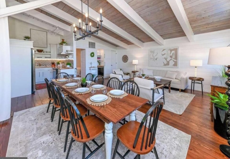 Charming beach cottage with gorgeous wood ceilings and shiplap throughout.