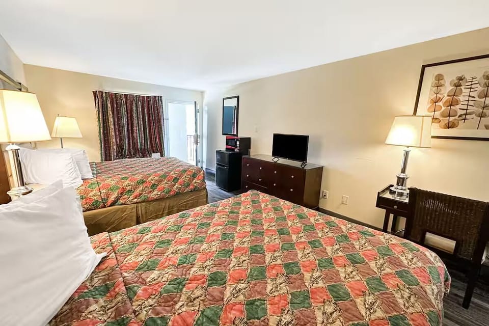 Stretch out with extra space, light, and two plush beds.