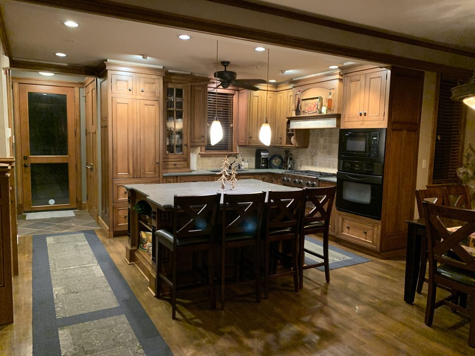 Custom, fully stocked kitchen.