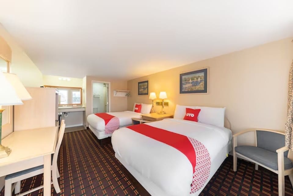 Stretch out in a spacious room with two comfy beds.