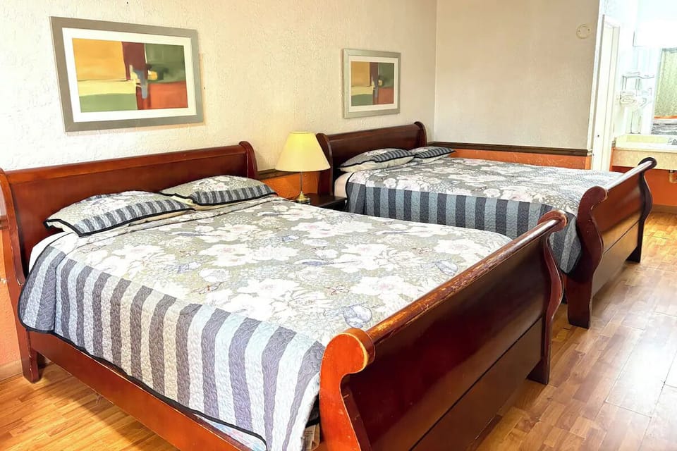 Gather and recharge with two beds and room to move.