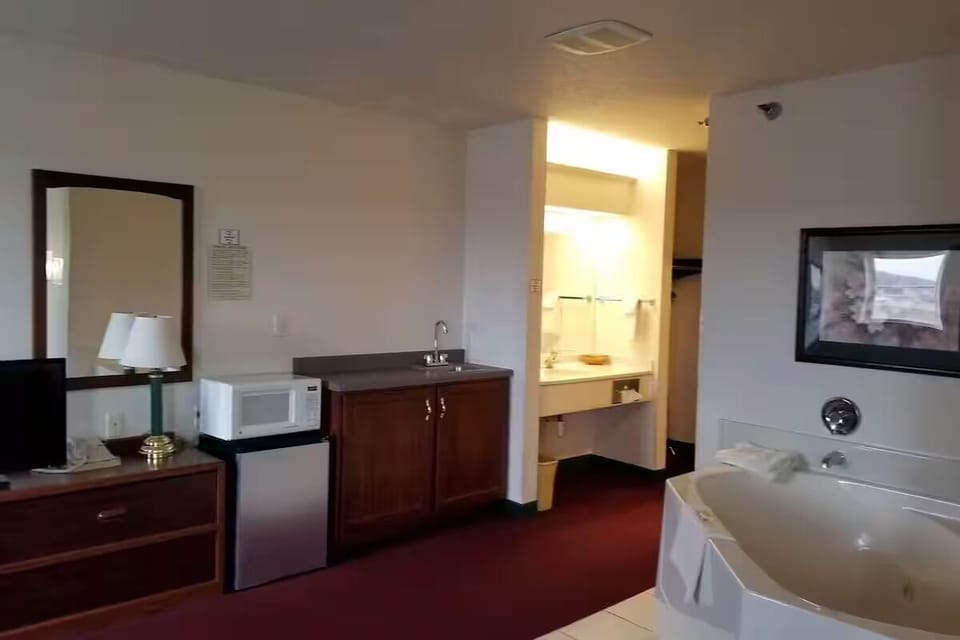 Soak in your private whirlpool, then enjoy easy in-room snacks.