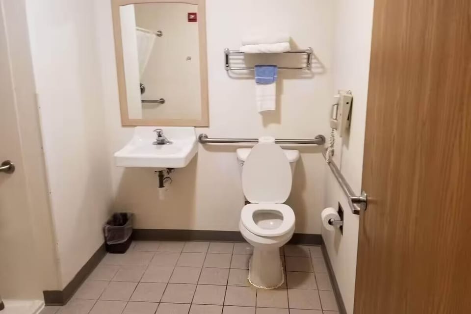 Start your day with an easy, accessible vanity and bright mirror.
