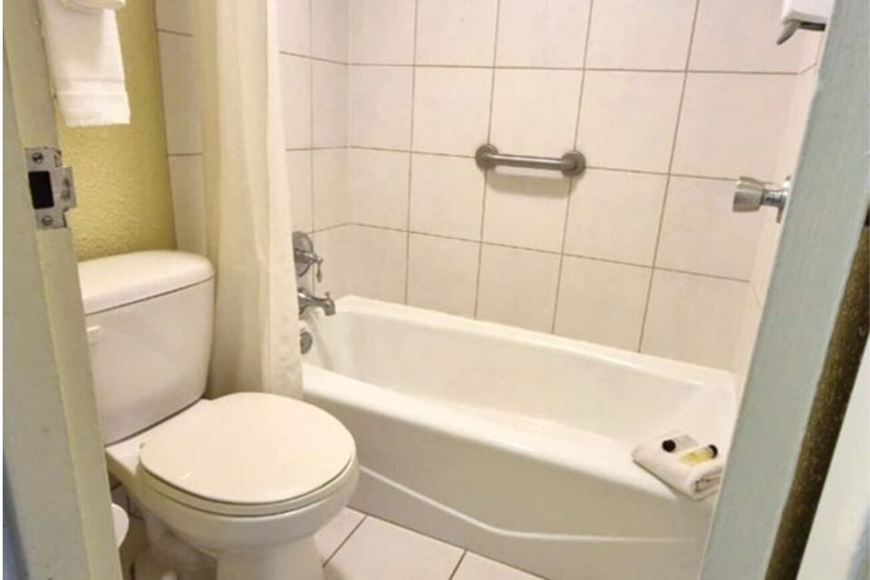 Soak away the day with a clean, simple tub shower.