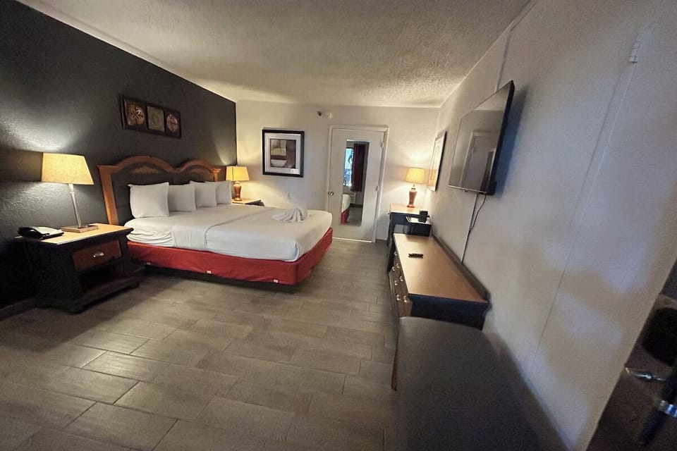 Settle in comfortably with a plush bed and TV.
