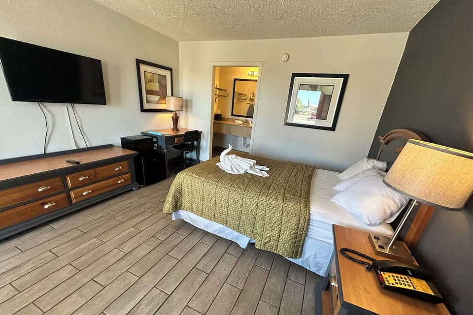 Kick back after adventures in a calm, comfortable bedroom.