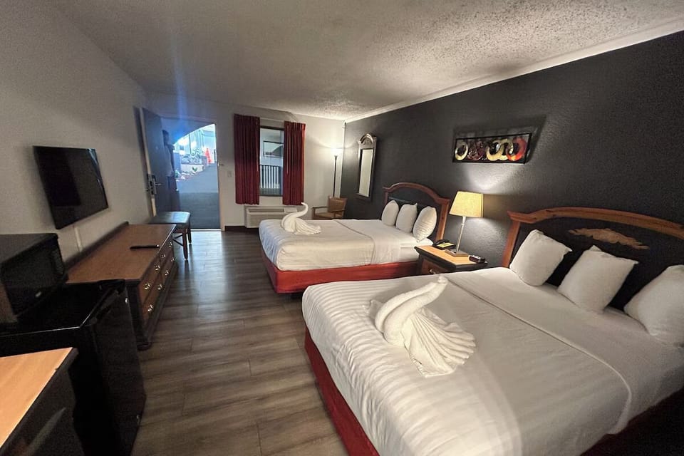 Settle into two plush beds after a long day.