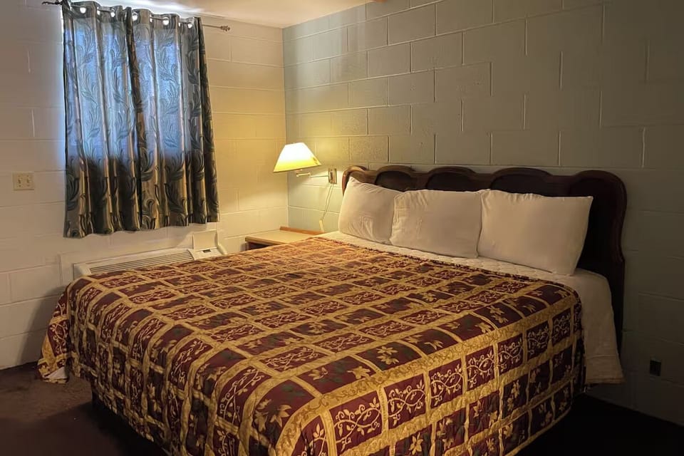 Drift off peacefully in a cozy king bed after adventures.