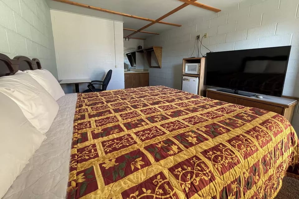 Unwind in a spacious king room with convenient in-room essentials.