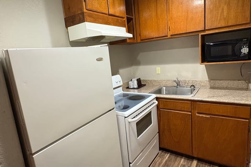 Relax together in this spacious suite with cozy seating.